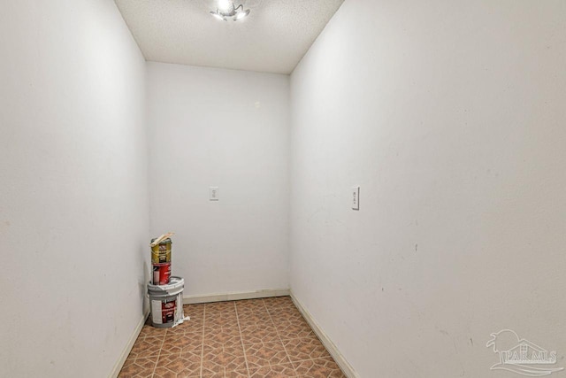 10449 Bernice Rd, Milton, FL 32583 - laundry area featuring light floors and baseboards