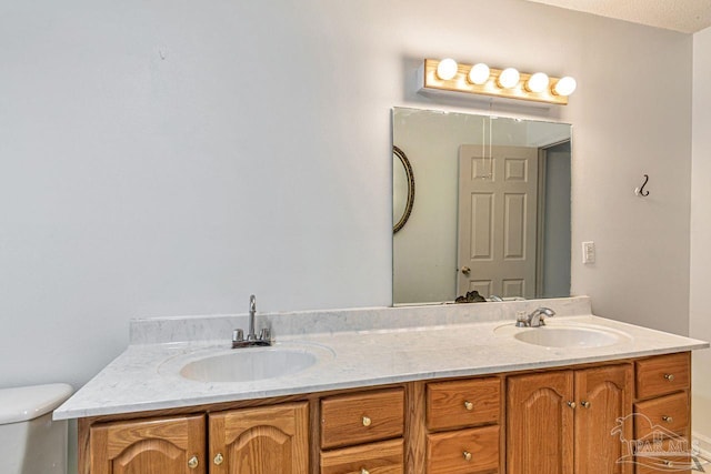 10449 Bernice Rd, Milton, FL 32583 - bathroom with double vanity and toilet