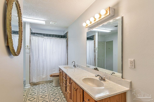 10449 Bernice Rd, Milton, FL 32583 - bathroom with toilet, a textured ceiling, double vanity, and a shower with curtain