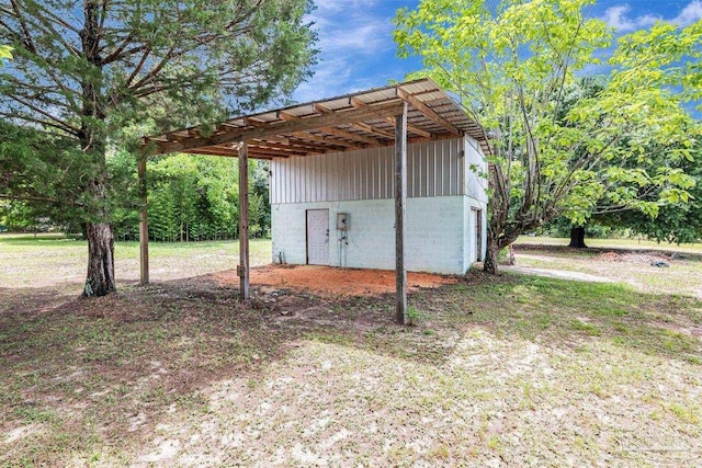 10449 Bernice Rd, Milton, FL 32583 - view of outbuilding with a carport
