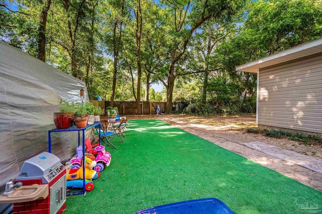 view of yard with a fenced backyard