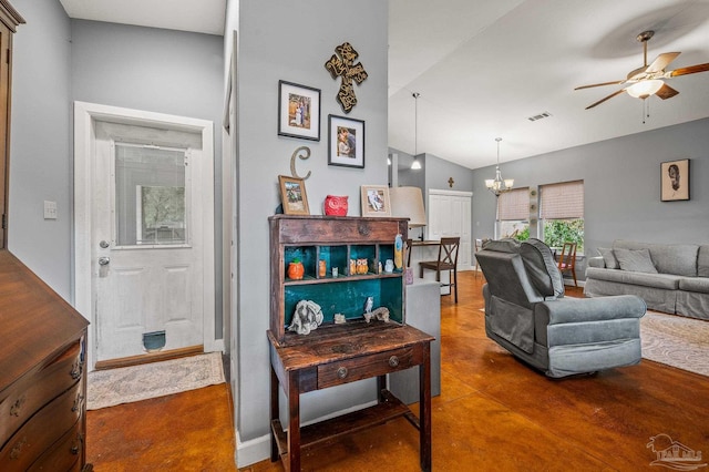 living room featuring visible vents, concrete floors, and ceiling fan with notable chandelier
