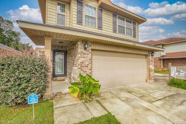 view of front of home with a garage