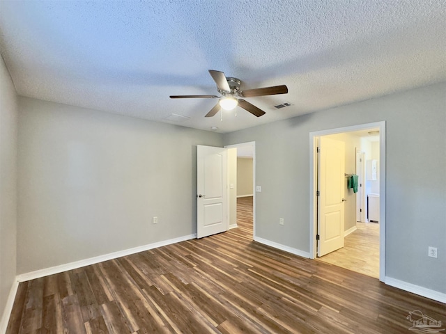 8037 Nalo Creek Loop, Pensacola, FL 32514 - unfurnished bedroom with wood finished floors, a textured ceiling, and ceiling fan