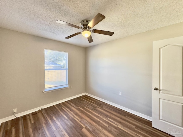 8037 Nalo Creek Loop, Pensacola, FL 32514 - spare room featuring dark wood-style floors, ceiling fan, and a textured ceiling