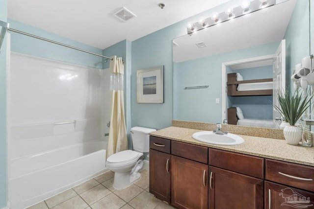 full bathroom with shower / bath combination with curtain, tile patterned floors, toilet, and vanity