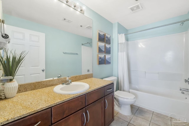 full bathroom featuring tile patterned flooring, vanity, toilet, and shower / bath combo with shower curtain