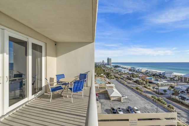 balcony featuring a water view