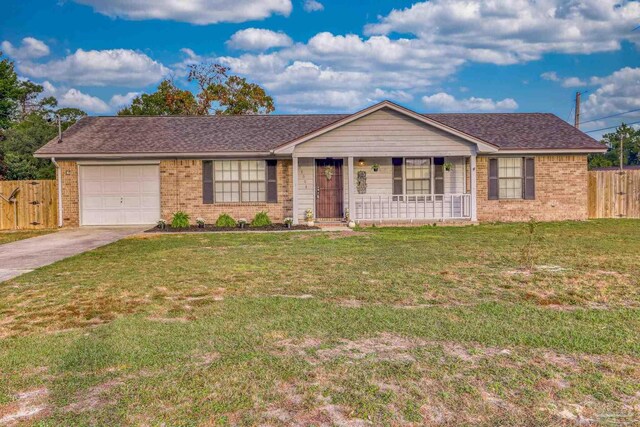 ranch-style house with a front yard and a garage