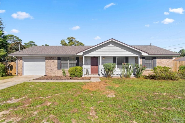 ranch-style home featuring a front yard, covered porch, and a garage