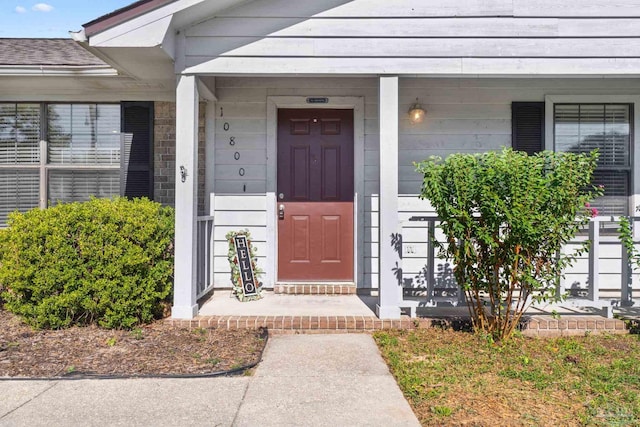 property entrance with a porch