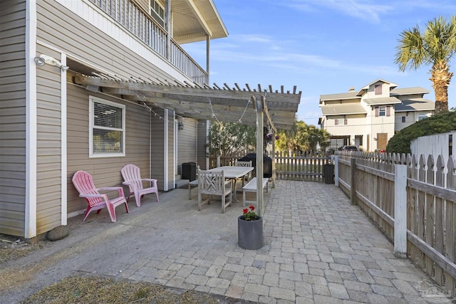 view of patio / terrace featuring a pergola and grilling area