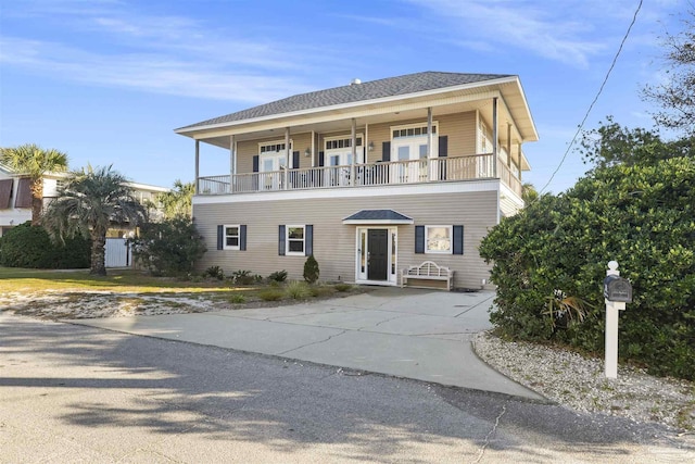 front of property featuring a balcony