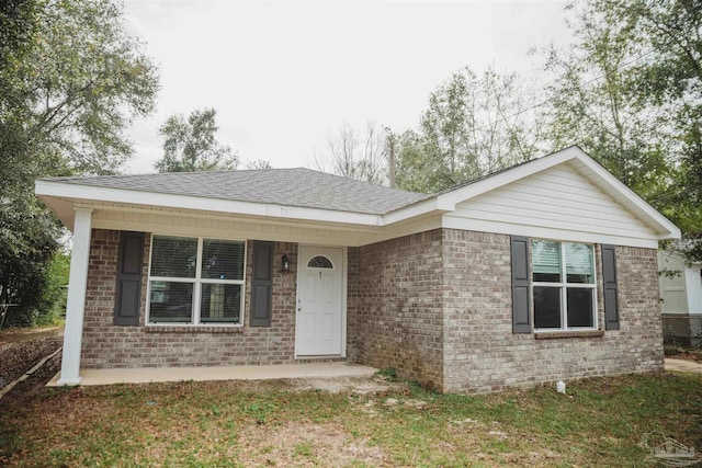 ranch-style home with a front yard