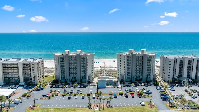 aerial view with a view of the beach and a water view