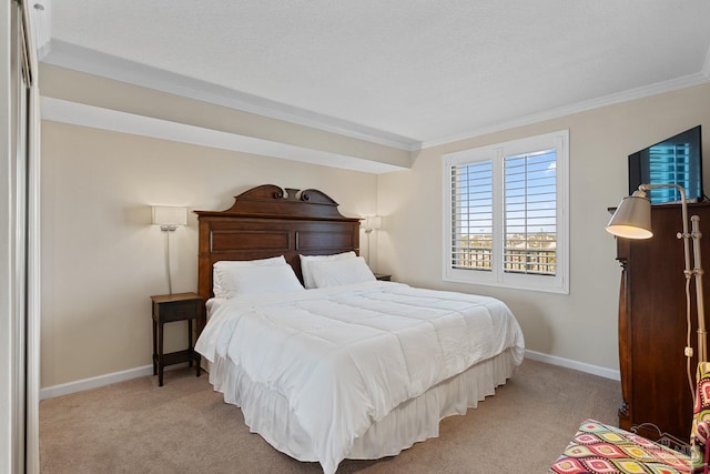 carpeted bedroom with ornamental molding