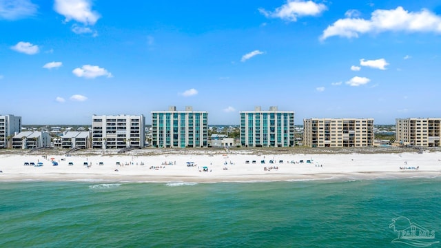 aerial view featuring a water view and a view of the beach