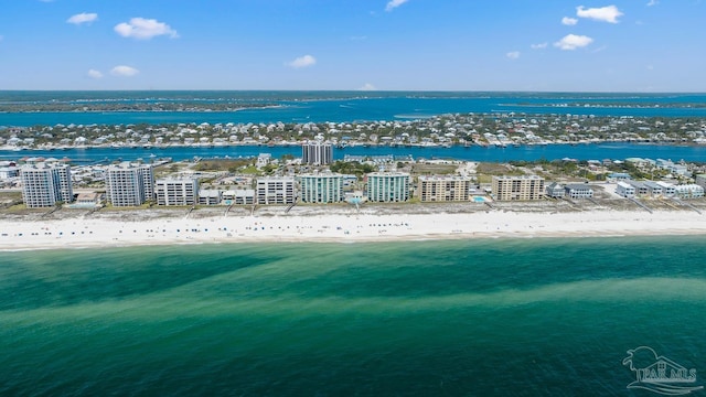 aerial view featuring a view of the beach and a water view