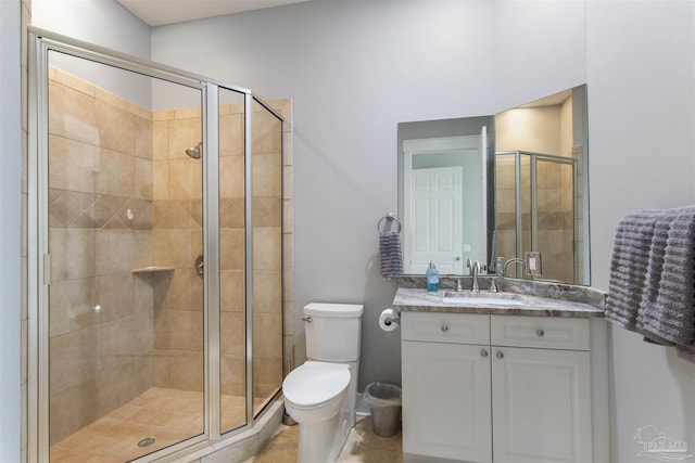 full bath featuring toilet, a stall shower, tile patterned floors, and vanity