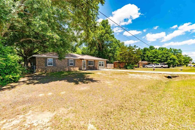 5518 Cyanamid Rd, Milton, FL 32583 - single story home with brick siding