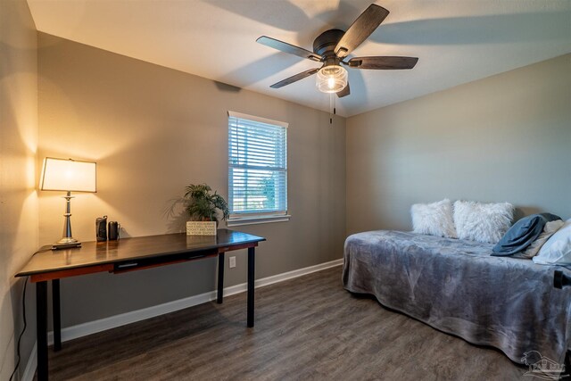 5518 Cyanamid Rd, Milton, FL 32583 - bedroom with wood finished floors, baseboards, an office area, and a ceiling fan