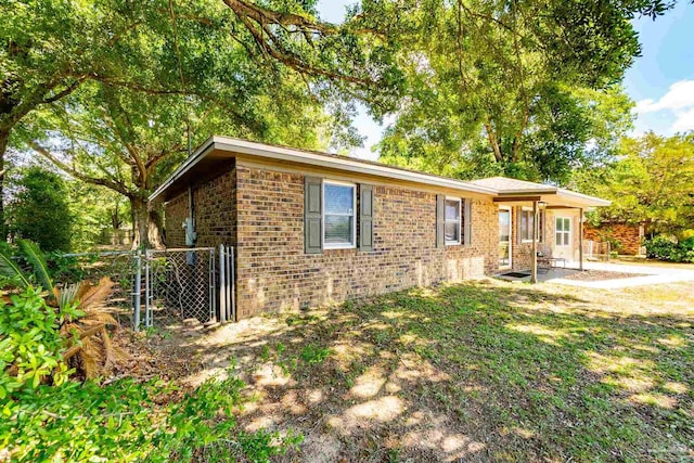 5518 Cyanamid Rd, Milton, FL 32583 - single story home with brick siding, a gate, and fence