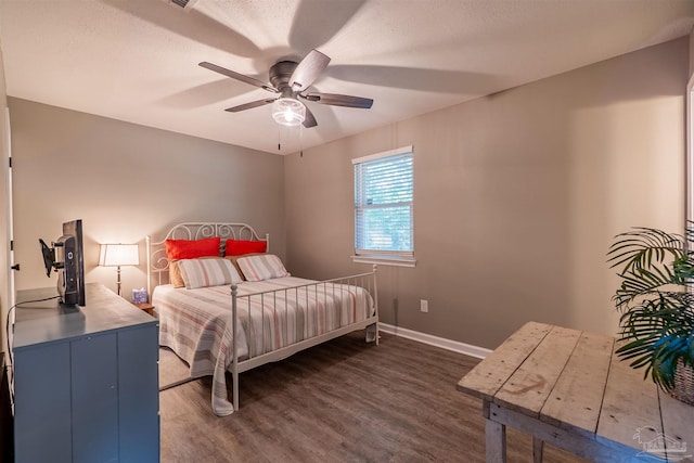 5518 Cyanamid Rd, Milton, FL 32583 - bedroom featuring dark wood-type flooring, baseboards, and ceiling fan