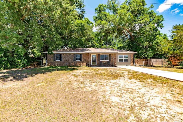 5518 Cyanamid Rd, Milton, FL 32583 - single story home with concrete driveway and brick siding