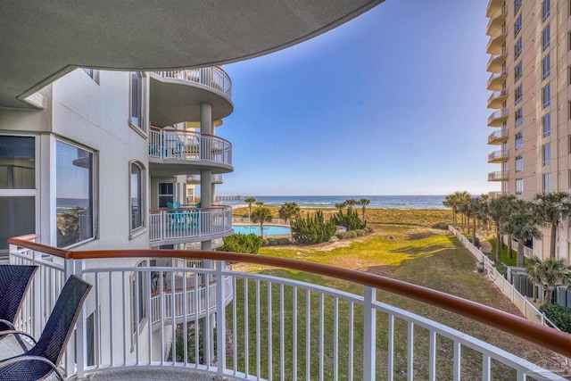 balcony featuring a water view