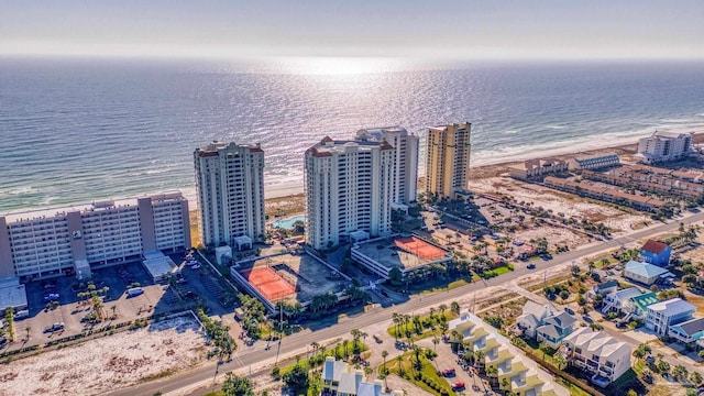 aerial view featuring a water view and a view of the beach