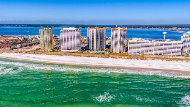 aerial view featuring a water view and a view of the beach