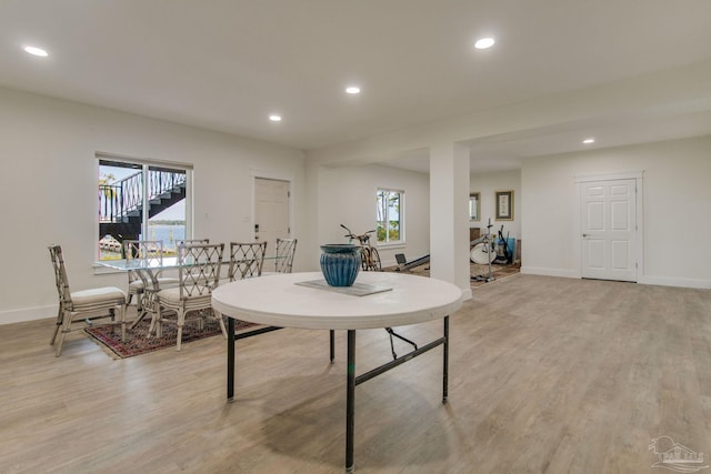 dining area with light hardwood / wood-style flooring