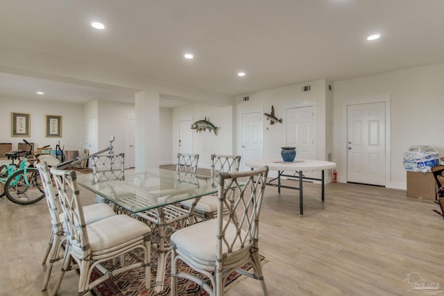 dining room featuring light wood-type flooring