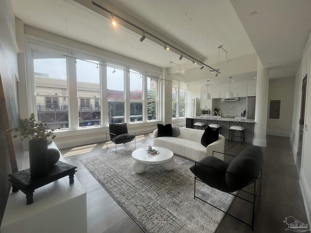 sunroom featuring electric panel