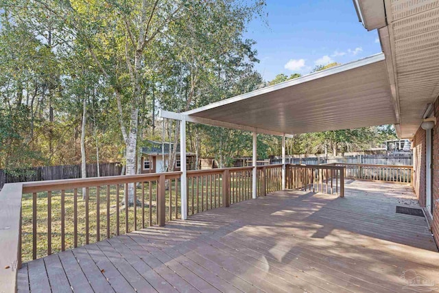 deck featuring an outbuilding