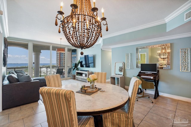 4 Portofino Dr Unit 803, Pensacola Beach, FL 32561 - tiled dining area featuring a chandelier and crown molding