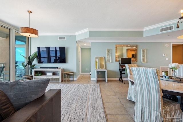 4 Portofino Dr Unit 803, Pensacola Beach, FL 32561 - living area featuring crown molding, tile patterned flooring, and baseboards