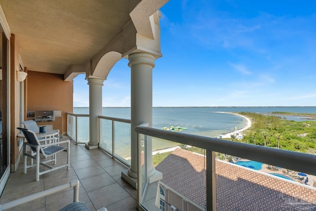 4 Portofino Dr Unit 803, Pensacola Beach, FL 32561 - balcony with a water view and grilling area