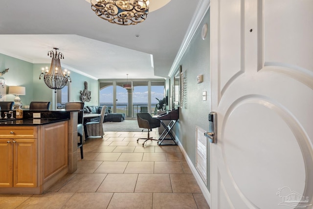 4 Portofino Dr Unit 803, Pensacola Beach, FL 32561 - foyer entrance featuring a chandelier, crown molding, and light tile patterned floors