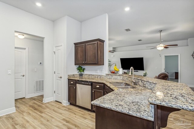 kitchen featuring light hardwood / wood-style floors, kitchen peninsula, dishwasher, ceiling fan, and sink