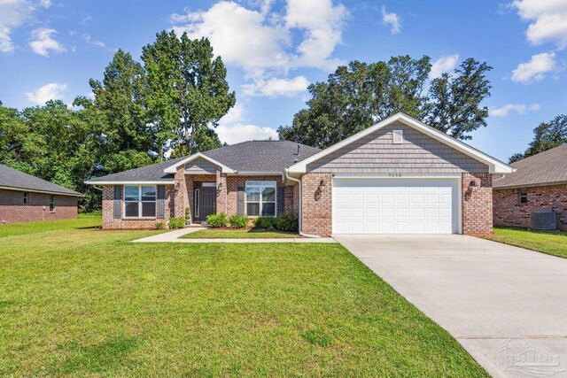 ranch-style house with a garage, a front lawn, and central AC