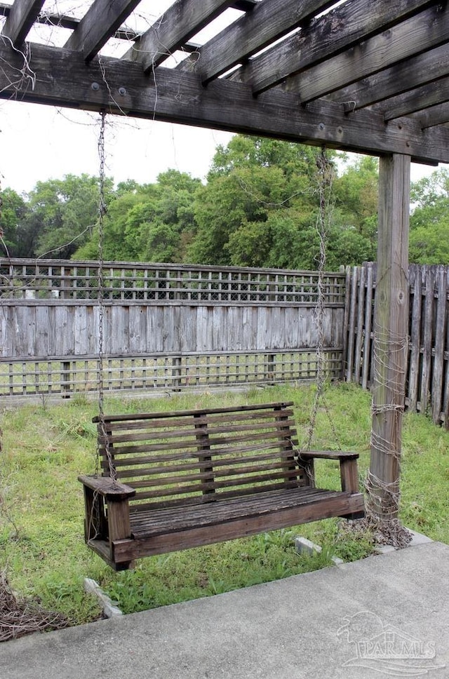 surrounding community with a pergola and a fenced backyard