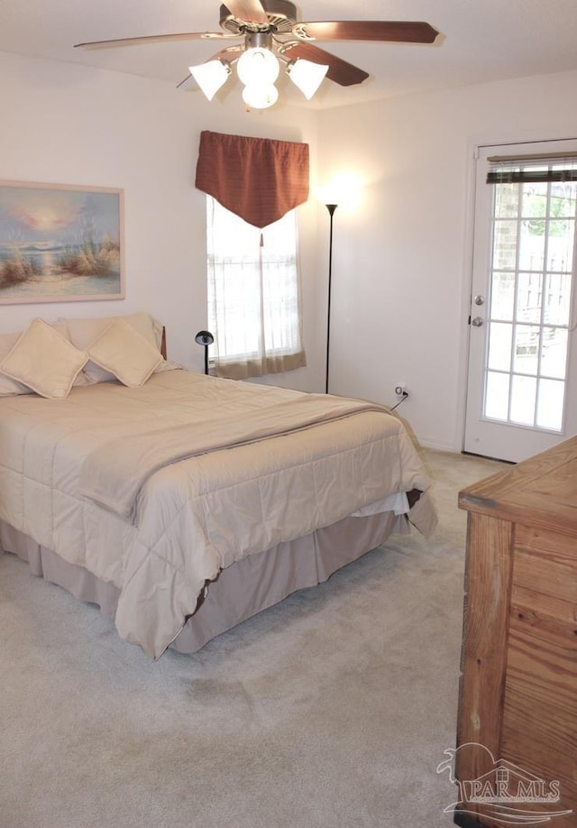 bedroom featuring a ceiling fan and carpet flooring