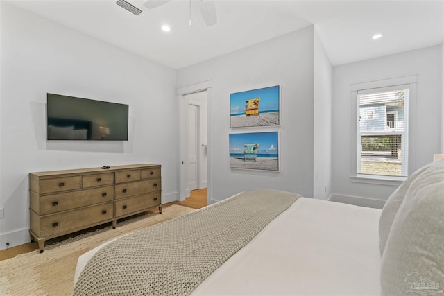 bedroom featuring ceiling fan and light wood-type flooring