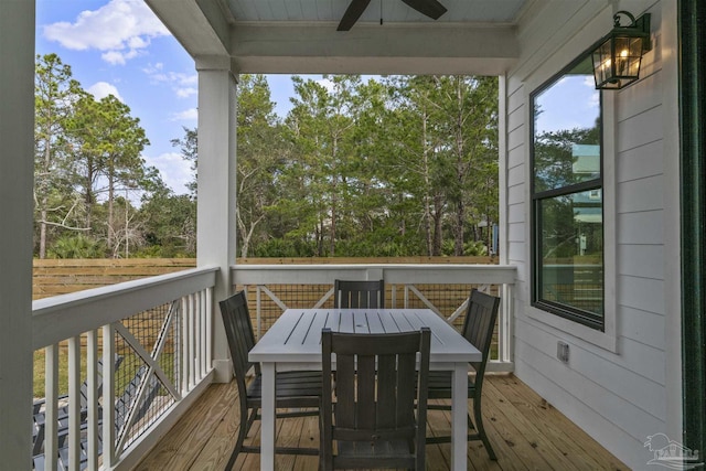 wooden deck with ceiling fan