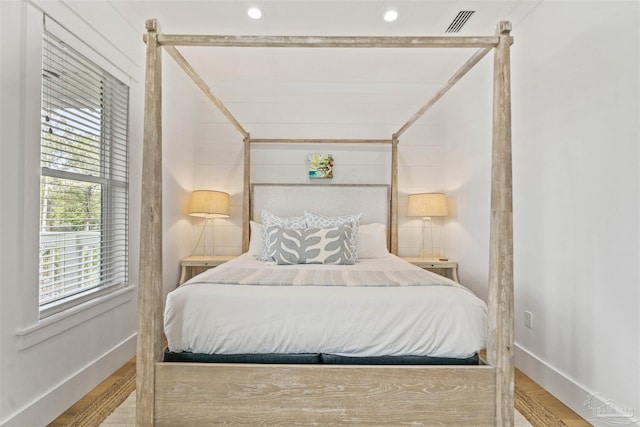 bedroom featuring wood-type flooring