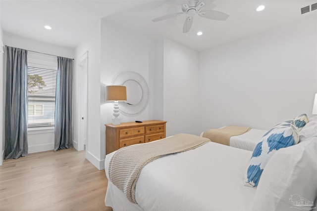 bedroom featuring ceiling fan and light wood-type flooring