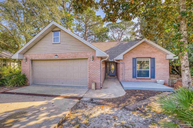 view of front of property featuring a garage