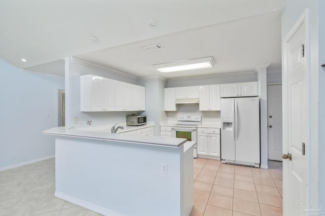 kitchen featuring kitchen peninsula, white cabinetry, crown molding, and white appliances