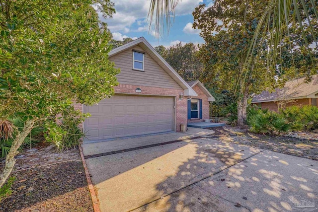 view of front of home with a garage